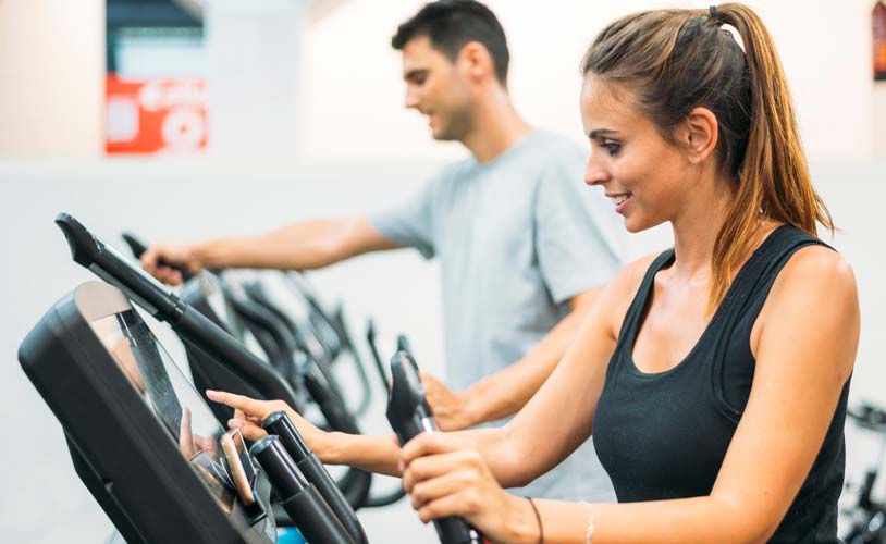 Women Working Out On Treadmill Women Working Out On Treadmill
